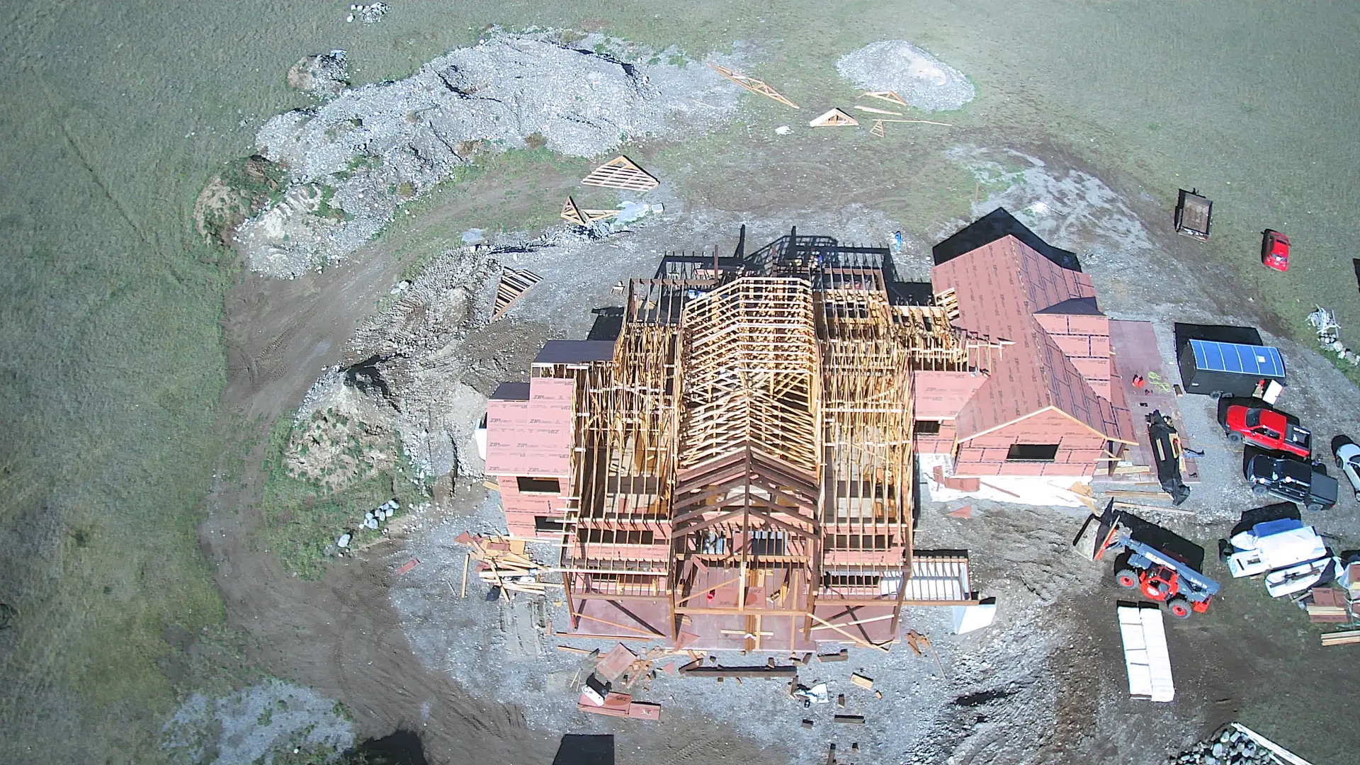 A drone view straight down onto a home being framed
